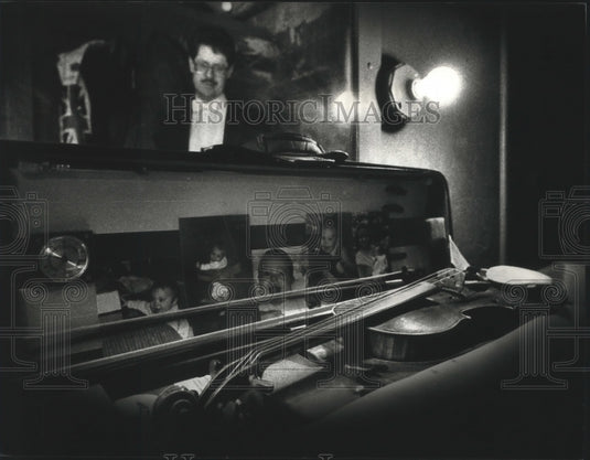 1990 Press Photo Violin Case with Photos of Concertmaster J. Patrick Rafferty - Historic Images