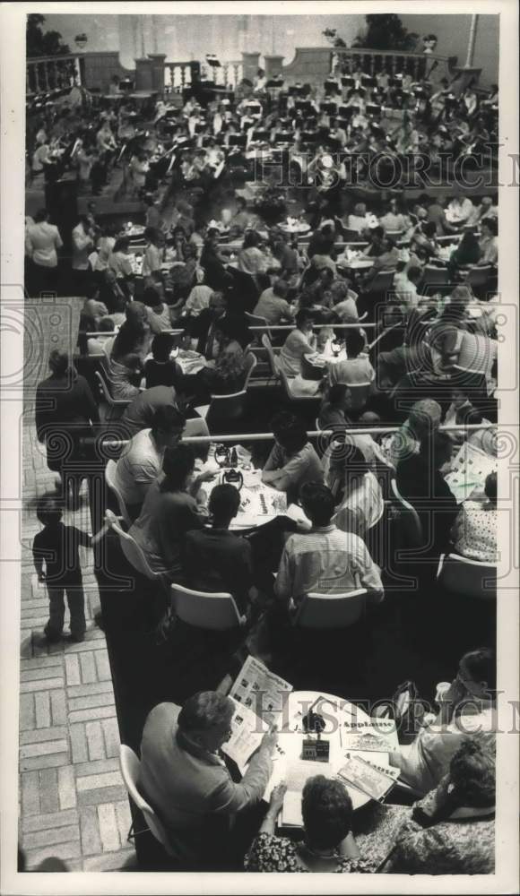 1988, Concertgoers listen to Milwaukee Symphony Orchestra performance - Historic Images