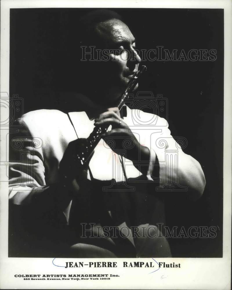 1968, Flutist Jean-Pierre Rampal playing the flute - mjp23663 - Historic Images