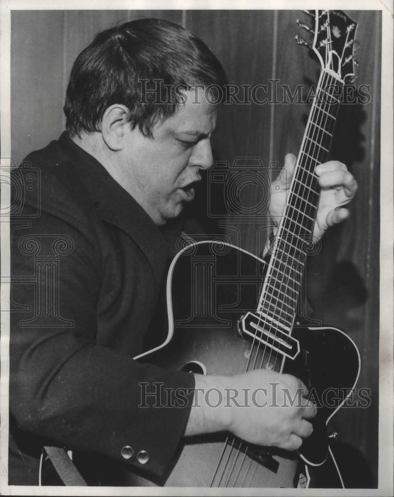 1970, Jazz guitarist George Pritchett during performance - mjp23838 - Historic Images