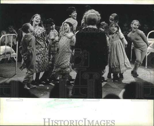 1983 "Annie" with lots of orphans dancing at the Melody Top Theater. - Historic Images