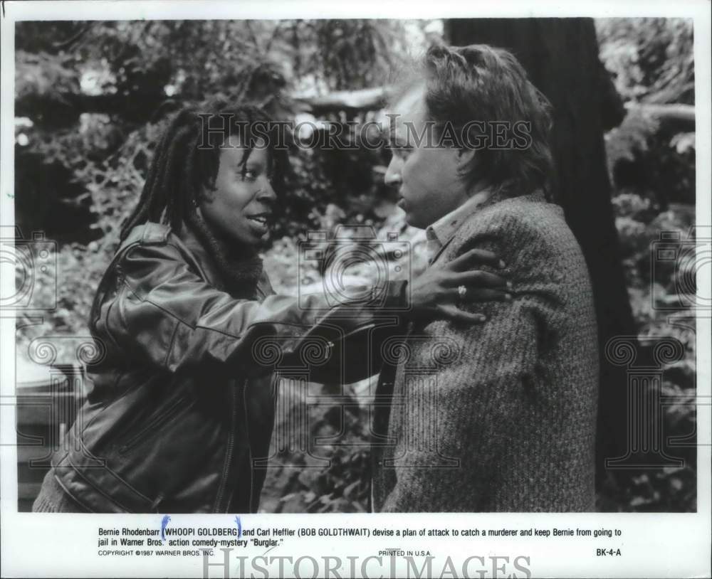 1987, Whoopi Goldberg holding Bob Goldthwait in comedy "Burglar." - Historic Images