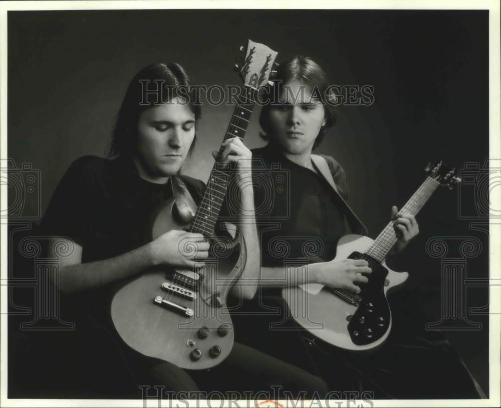 1992, Members of rock &amp; roll band &quot;Raw Courage&quot; with their guitars - Historic Images