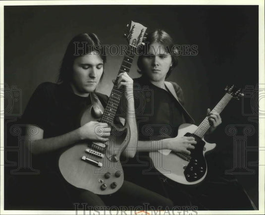 1992, Members of rock & roll band "Raw Courage" with their guitars - Historic Images