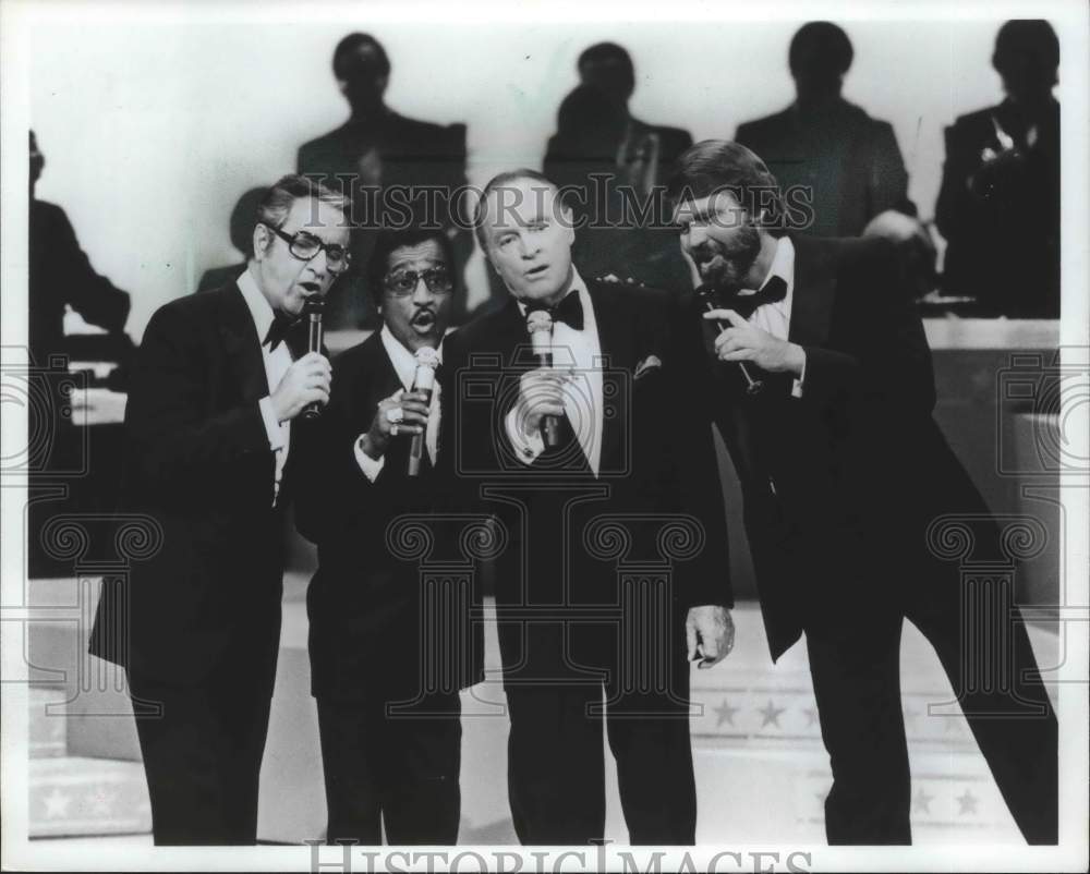 1981, Entertainer Bob Hope &amp; others singing with a band in TV special - Historic Images