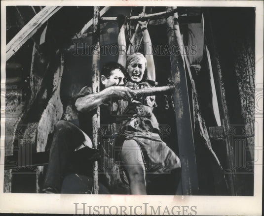 1965, Kieron Moore and Janette Scott in "Crack in the World" - Historic Images