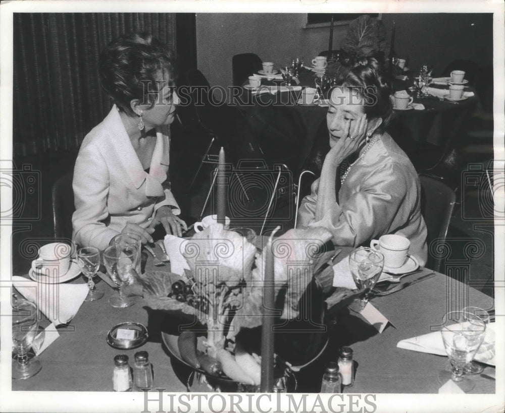 1965, Lynn Fontanne rests at table at a dinner held at the art center - Historic Images