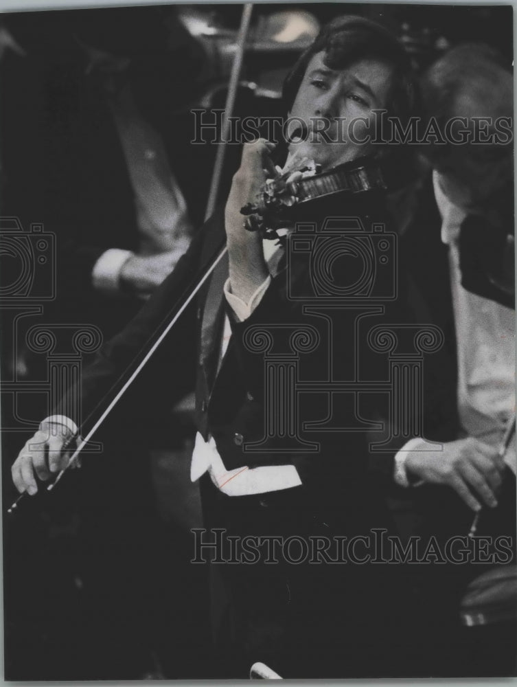1974, Daniel Heifetz playing violin for Mendelssohn masterwork. - Historic Images