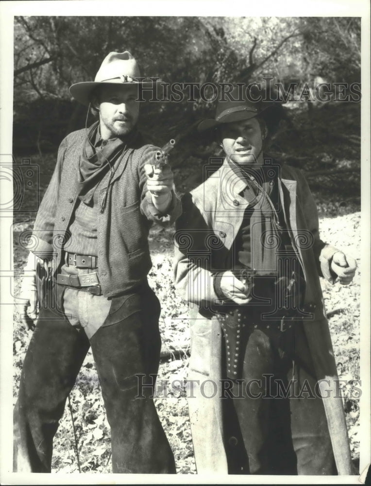 1988 Press Photo Bruce Boxleitner and Gregory Harrison in Red River remake-Historic Images