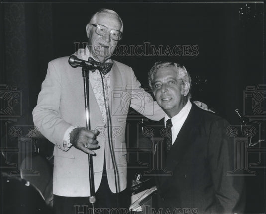 1981, Bandleader Ray McKinley & Kenneth Jamron at a dinner-dance - Historic Images