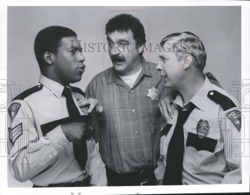 1977, Actor Victor French as a sheriff in scene with his &quot;deputies&quot; - Historic Images