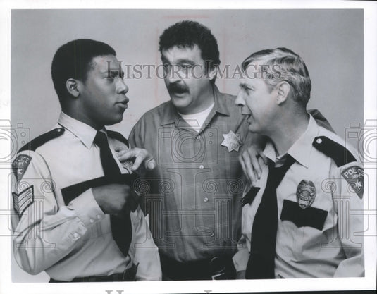 1977, Actor Victor French as a sheriff in scene with his "deputies" - Historic Images