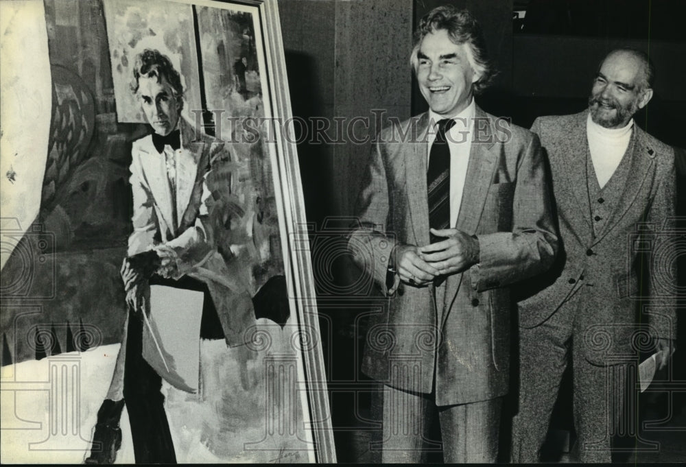 1981, Artist Alan Gass unveils portrait of Kenneth Schermerhorn - Historic Images