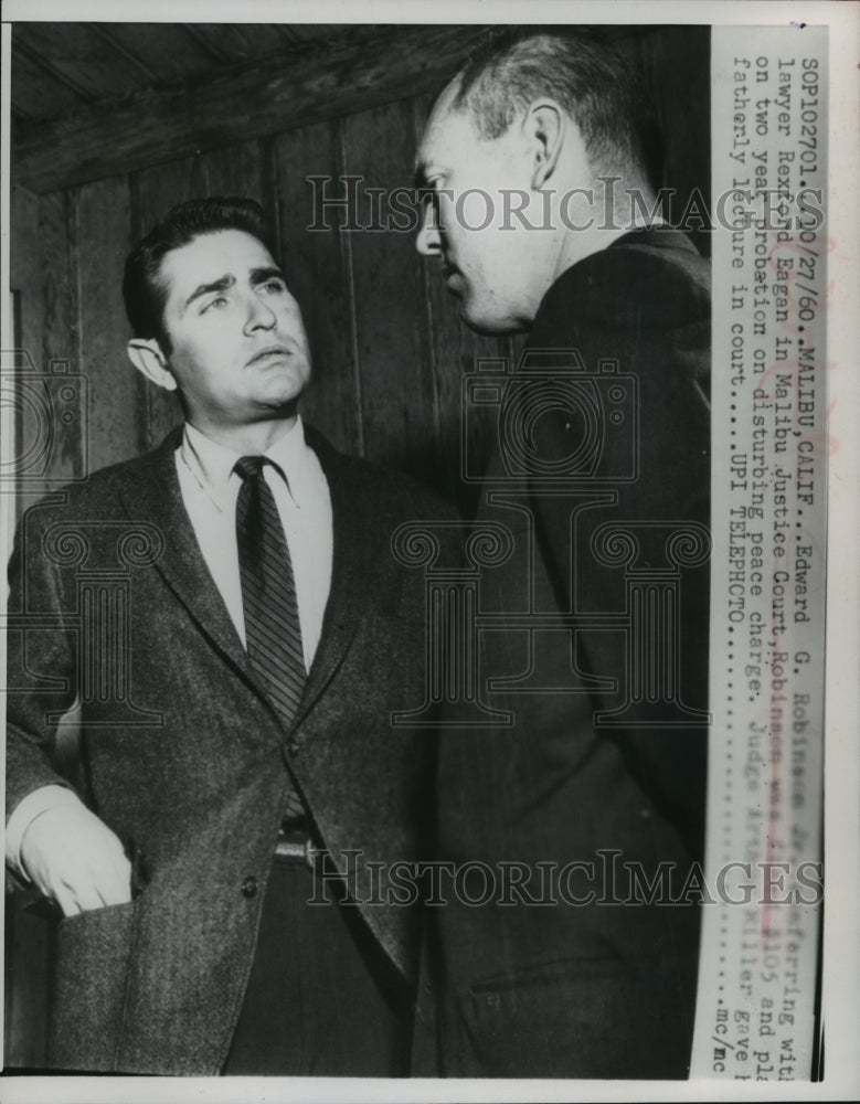 1960, Malibu, California-Edward G. Robinson Jr. confers with lawyer. - Historic Images