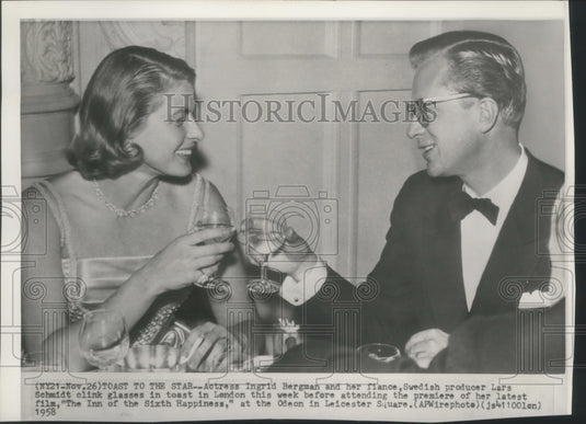 1958, Actress Ingrid Bergman & her fiancee, Lars Schmidt in London - Historic Images