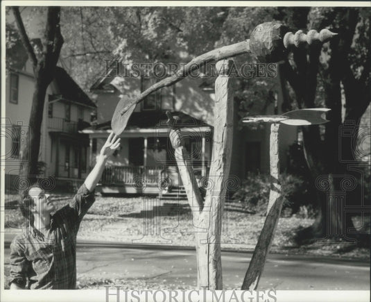 1994, Artist Alan Jung with his wind driven vane called "Tree Fish" - Historic Images