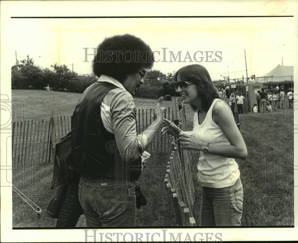 1979, Junior Brantley of Short Stuff talks to a fan after performance - Historic Images