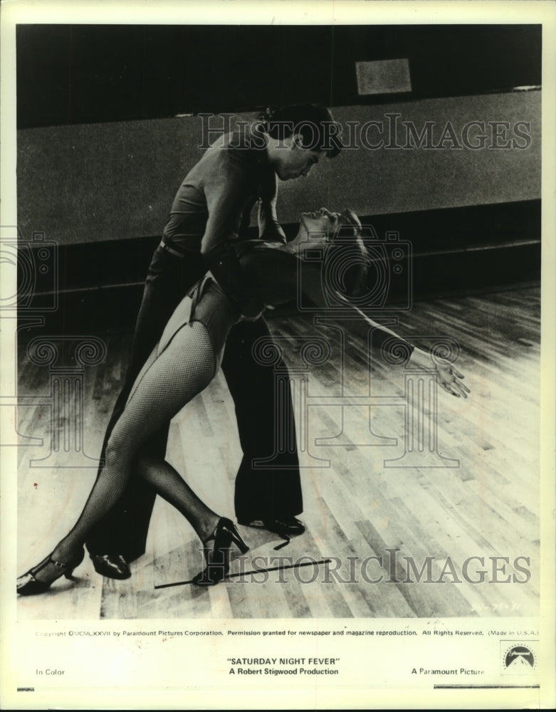 1978, John Travolta and Karen Gorney dance in Saturday Night Fever - Historic Images