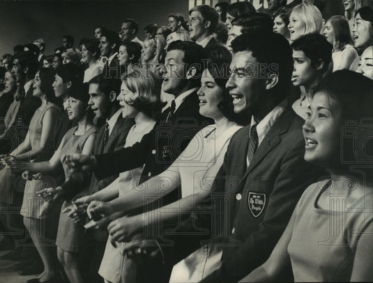 1968, Cast members of "Up With People!" serenade Milwaukeeans - Historic Images