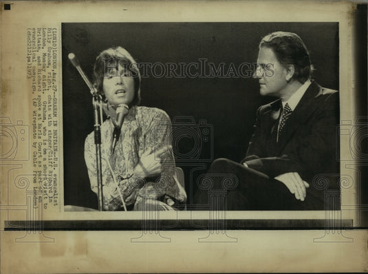 1973, U.S. evangelist Billy Graham & singer Cliff Richard, London - Historic Images