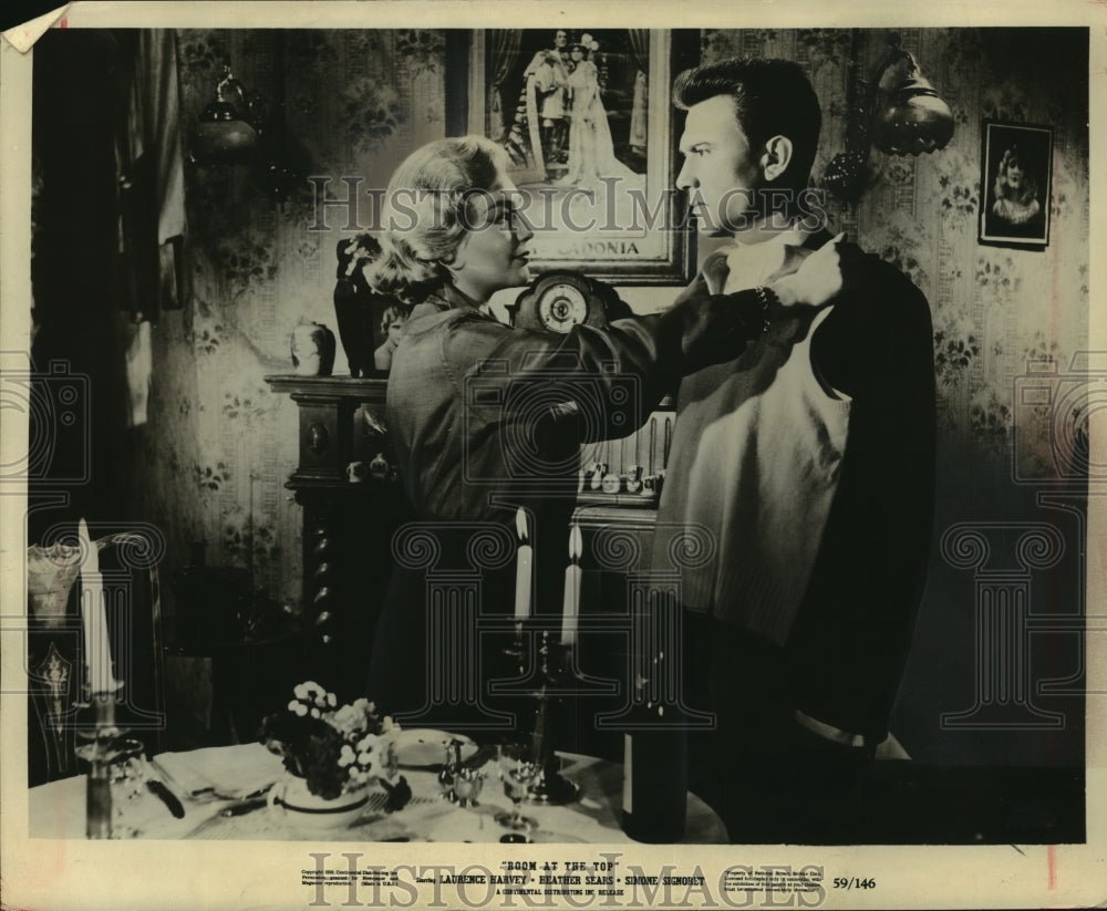1961, Laurence Harvey and Simone Signoret star in "Room at the Top" - Historic Images