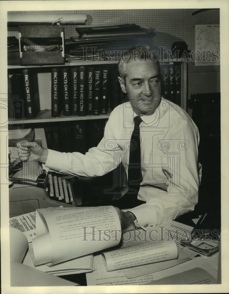 1962, Howard K. Smith, of News and Comment, sits at desk working, - Historic Images