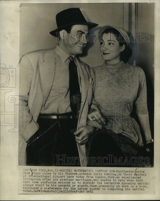 1951, Bandleader, Artie Shaw, with fiancee, Doris Dowling, New York - Historic Images