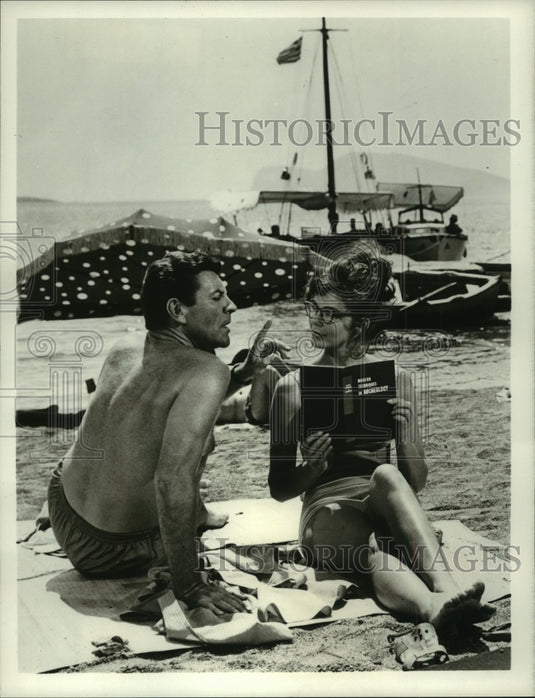 1967, Actors Robert Preston and Georgia Moll star in "Island of Love" - Historic Images