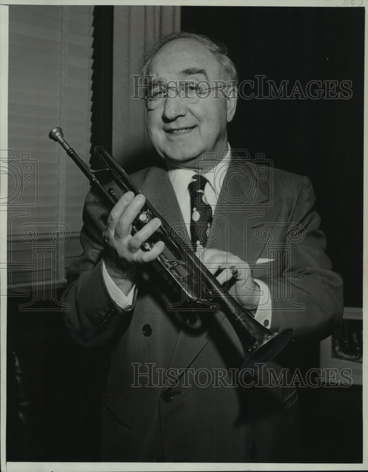 1956, James C. Petrillo hold trumpet that he no longer plays - Historic Images