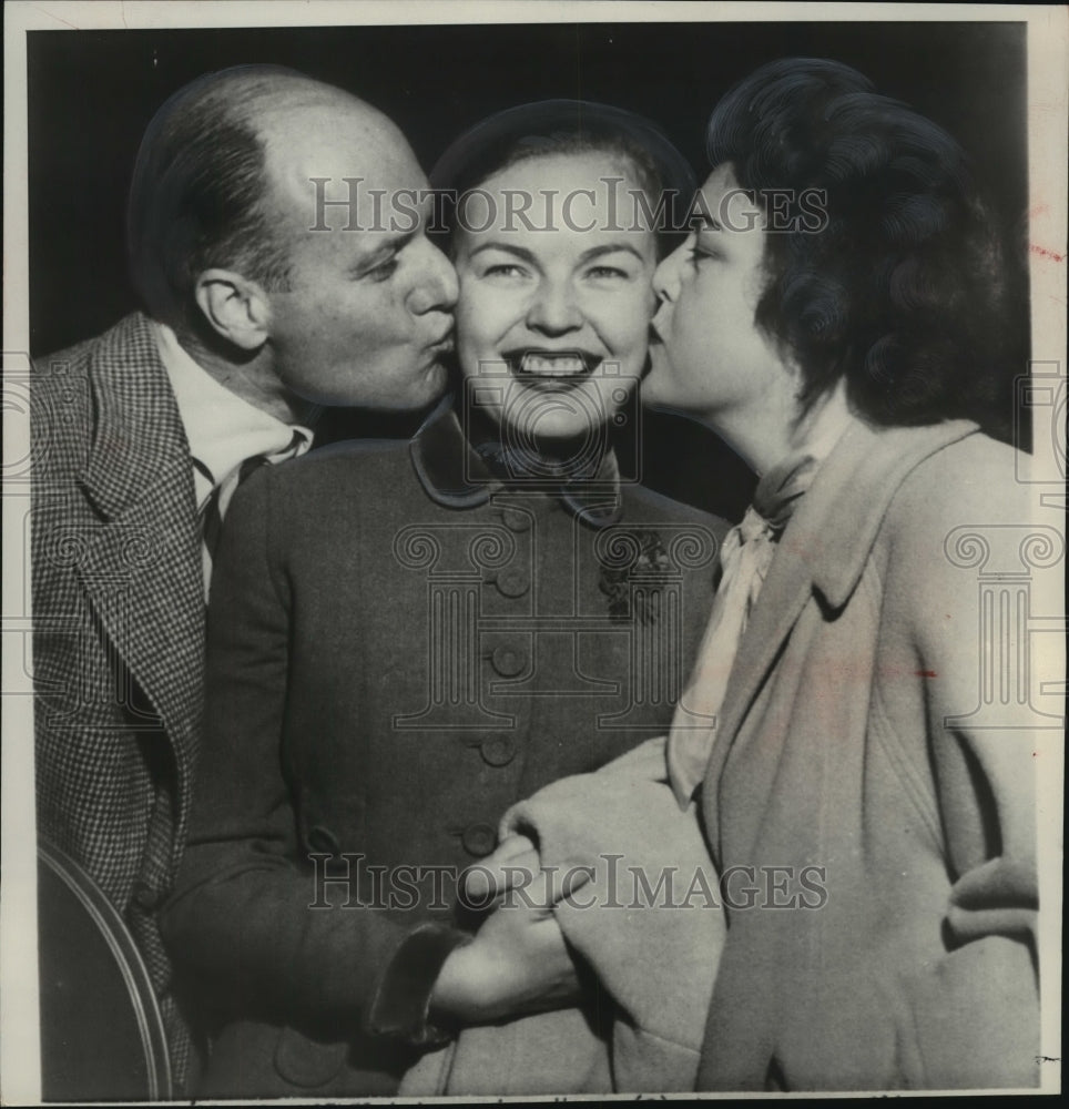 1953, Actress June Haver is greeted by her parents after convent stay - Historic Images