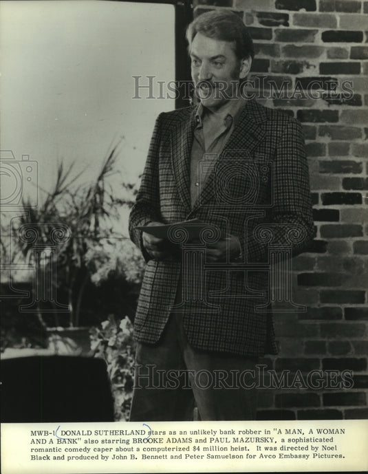 1980, Donald Sutherland stars in "A Man, a Woman and a Bank" - Historic Images