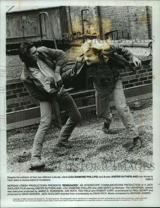 1989 Press Photo Lou Diamond Phillips & Kiefer Sutherland star in "Renegades" - Historic Images