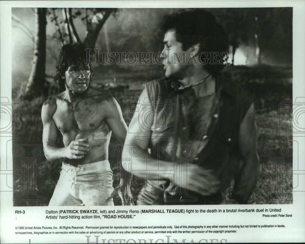 1989, Patrick Swayze and Marshall Teague fighting in &quot;Road House&quot; - Historic Images