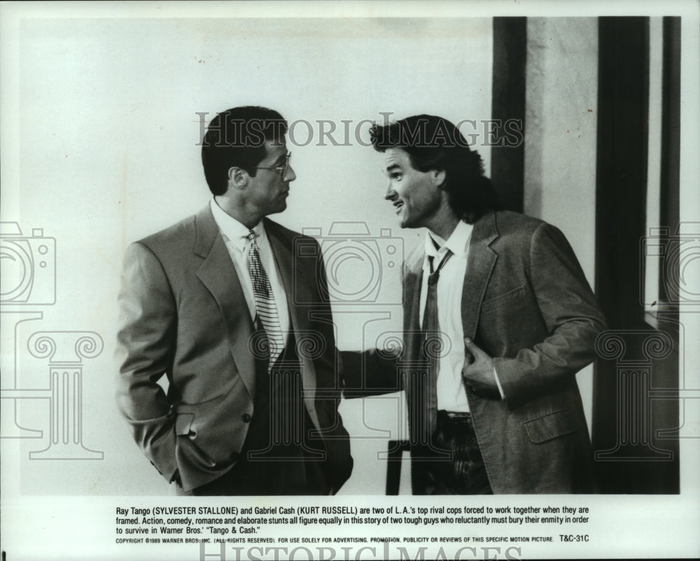 1989, Actors Sylvester Stallone &amp; Kurt Russell in &quot;Tango &amp; Cash&quot; - Historic Images