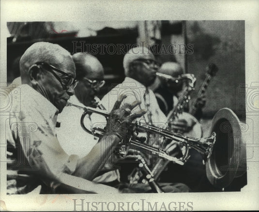 1977, Kid Thomas Valentine plays the trumpet with jazz band - Historic Images