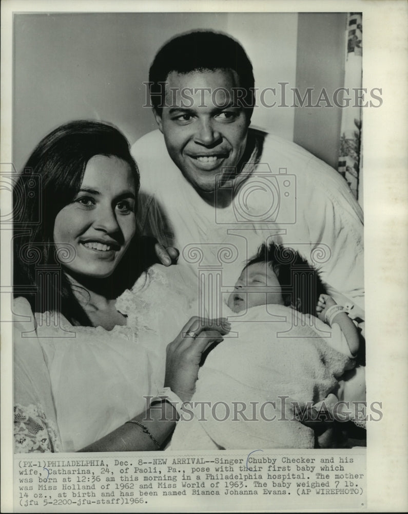 1966, Singer Chubby Checker and family in Philadelphia, Pennsylvania - Historic Images