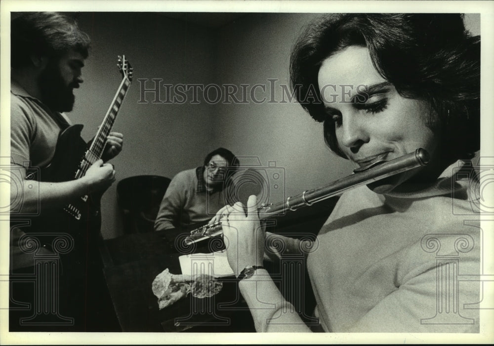 1981, Susan Sweet playing the flute with other musicians. - mjp42848 - Historic Images