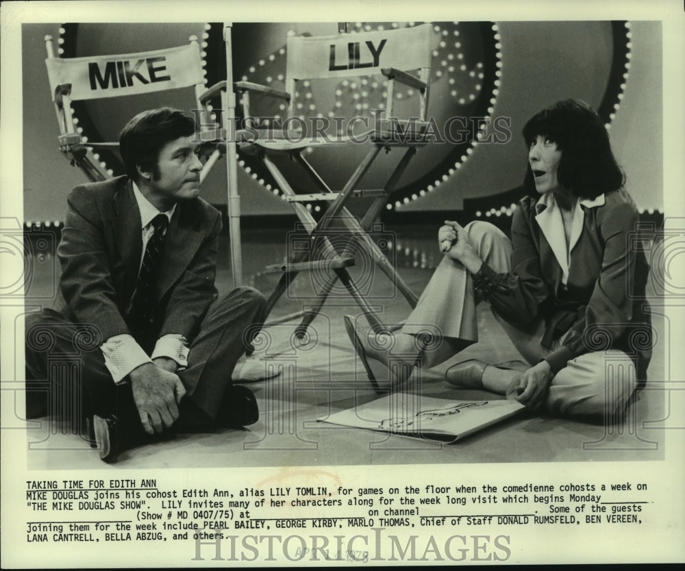 1975, TV host Michael Douglas with Edith Ann, alias Lily Tomlin - Historic Images
