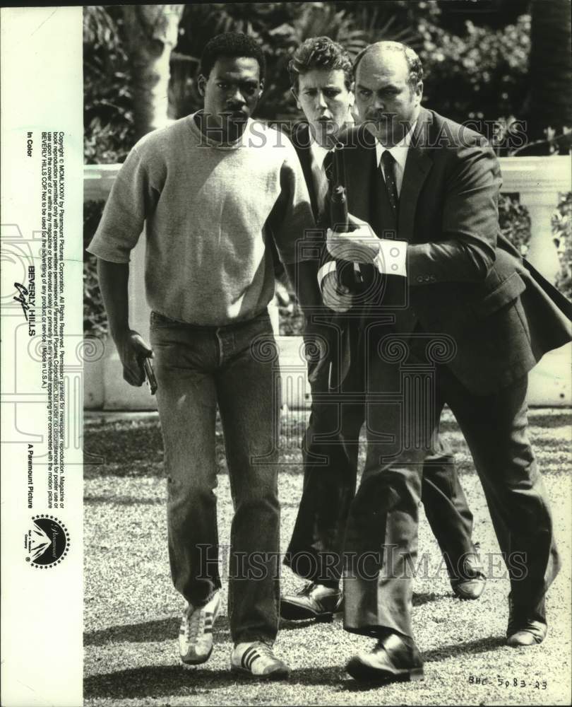 1985, Eddie Murphy, Judge Reinhold a&amp;ohn Ashton in Beverly Hills Cop - Historic Images