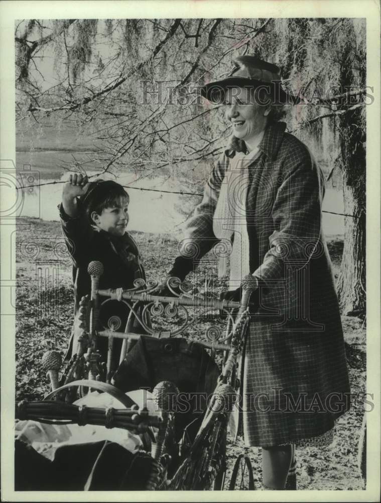 1967, Actress Geraldine Page with small children near lake - Historic Images