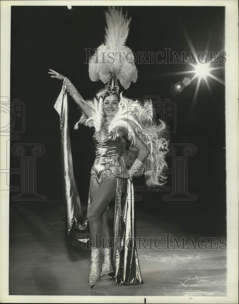 1969 Goldwyn girl skating in finale of 1969 Holiday on Ice show - Historic Images