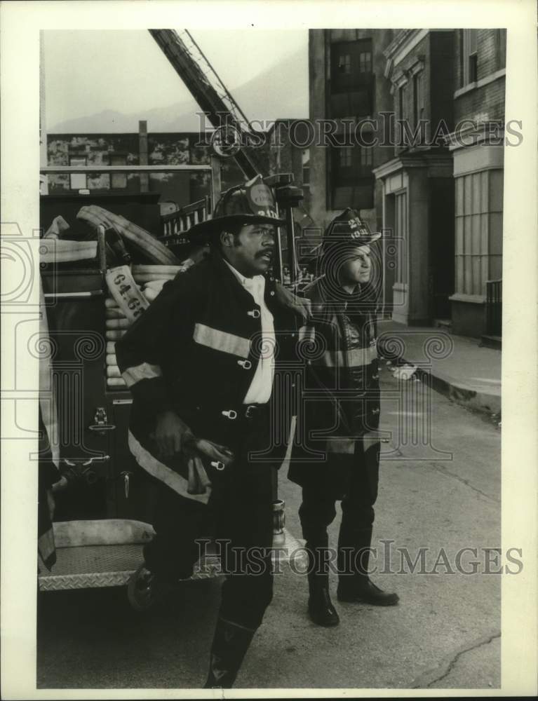 1958, Richard Roundtree and unidentified person portraying firemen - Historic Images