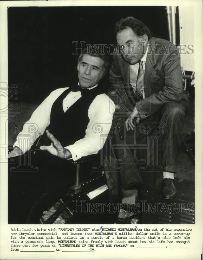 1984, Reporter Robin Leach visiting with Ricardo Montalban - Historic Images
