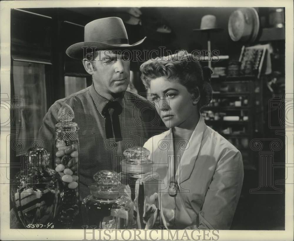 1956, Fred MacMurray and Dorothy Malone in scene from &quot;At Gunpoint&quot; - Historic Images