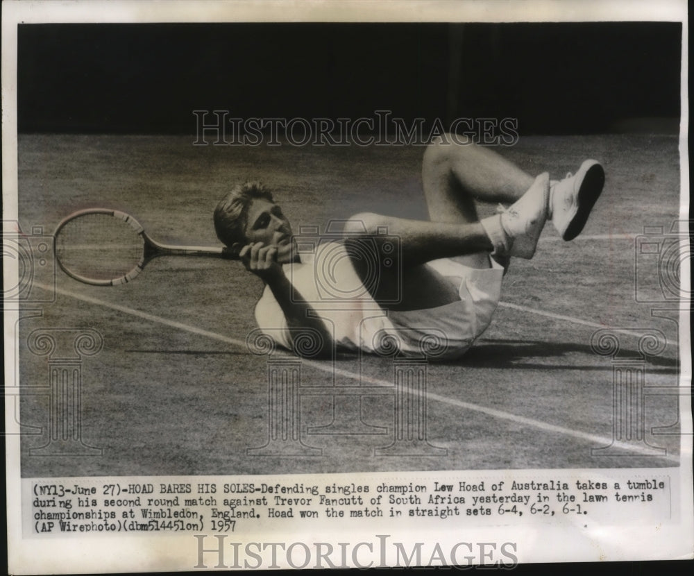 1957 Press Photo Defending singles champion Lew Hoad of Australia takes a tumble-Historic Images
