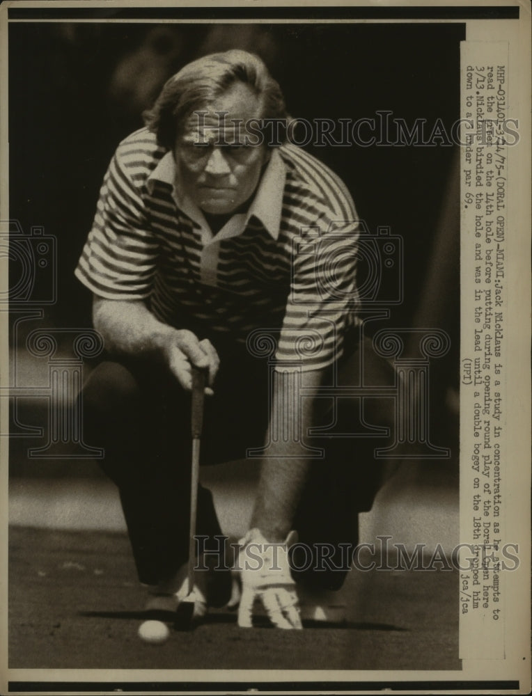 1975 Jack Nicklaus is study in concentration on the 14th hole. - Historic Images