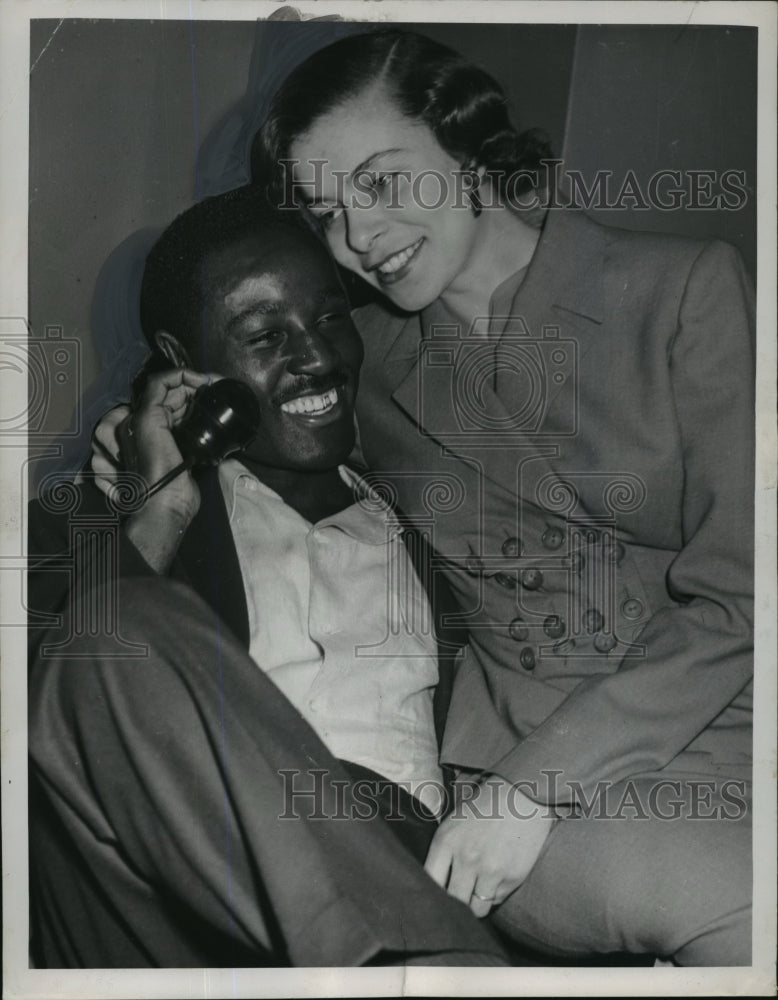 1951 Heavyweight boxing champion Ezzard Charles with wife in Chicago - Historic Images