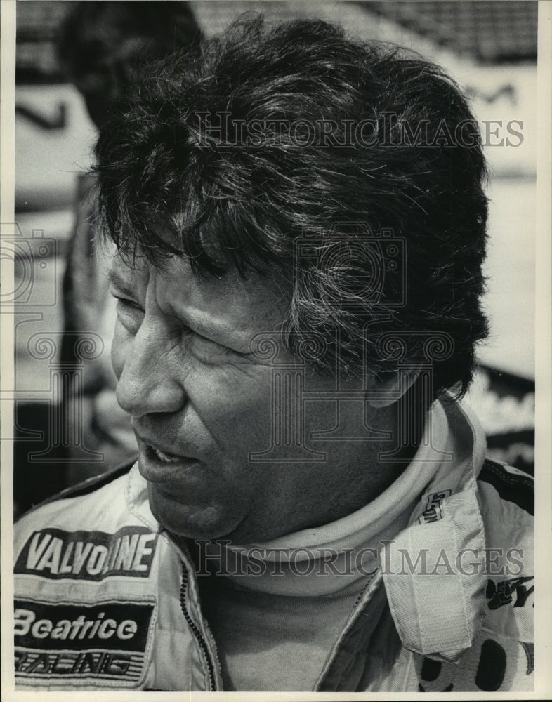 1983 Press Photo Racing champ Mario Andretti tests new car at State Fair Park-Historic Images