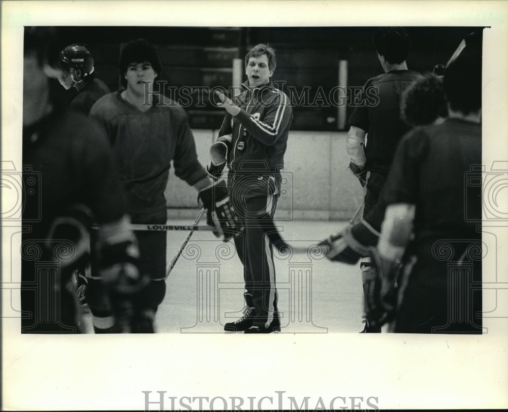 1984 Admiral hockey coach, Phil Wittliff, during practice session - Historic Images