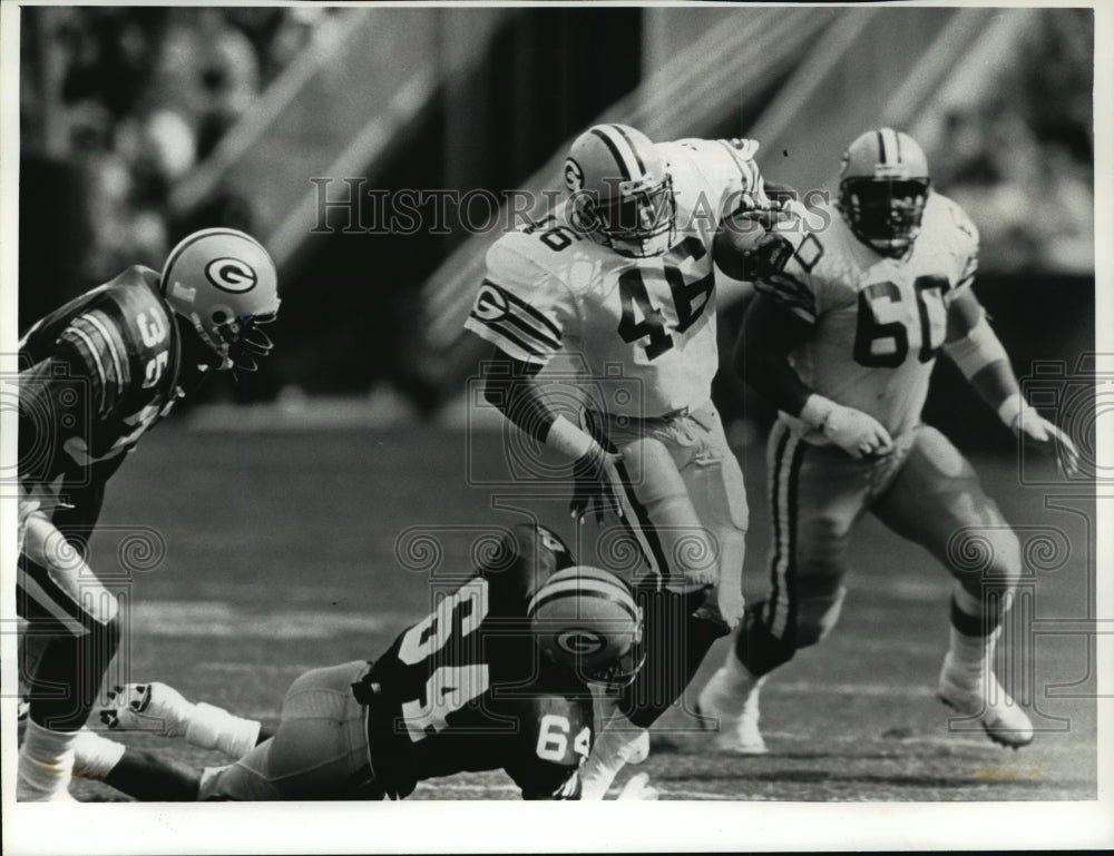 1992 Press Photo Vince Workman running the ball during a football game-Historic Images